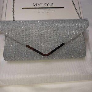 Glittery clutch purse with shoulder strap